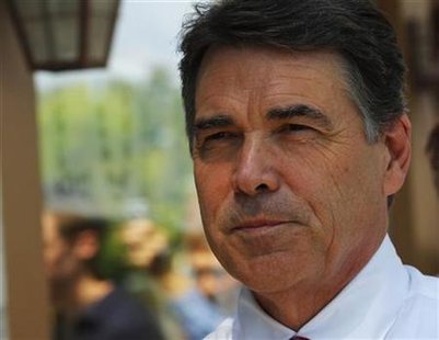 Republican presidential candidate Texas Governor Rick Perry leaves a campaign stop at Harvey's Bakery and Coffee Shop in Dover Republican presidential candidate Texas Governor Rick Perry leaves a campaign stop at Harvey's Bakery and Coffee Shop in Dover