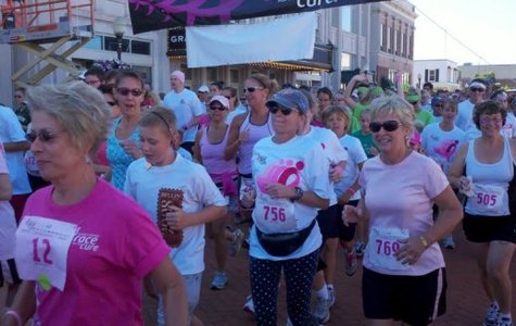 Walkers and runners participate in the 2nd annual Susan G. Komen Race for the Cure in Wausau, WI. Walkers and runners participate in the 2nd annual Susan G. Komen Race for the Cure in Wausau, WI.