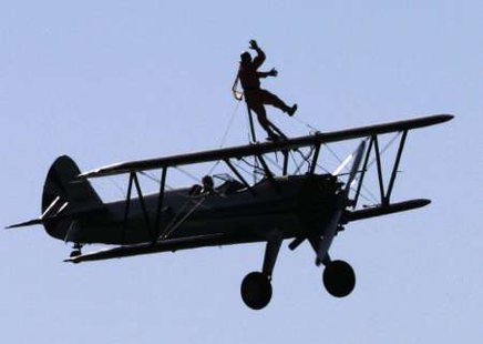 A wingwalker fell from a similar style plane as the above shown during an air show in Eastern Michigan Sunday. A wingwalker fell from a similar style plane as the above shown during an air show in Eastern Michigan Sunday.