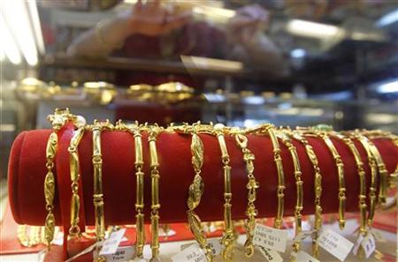 Gold products are displayed for sale at a gold shop in Hanoi Gold products are displayed for sale at a gold shop in Hanoi
