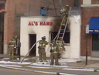 Al's Hamburger Shop in downtown Green Bay damaged by fire on Saturday August 20, 2011. (courtesy of FOX 11). Al's Hamburger Shop in downtown Green Bay damaged by fire on Saturday August 20, 2011. (courtesy of FOX 11).