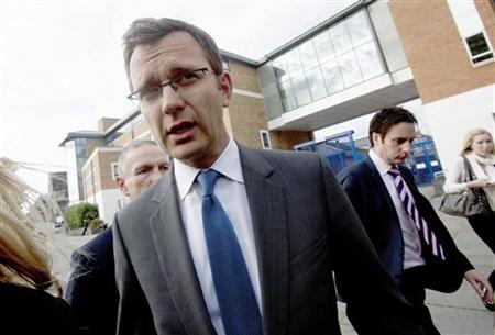 Andy Coulson, the former spokesman for Britain's Prime Minister David Cameron, leaves a police station after being bailed, in South London Andy Coulson, the former spokesman for Britain's Prime Minister David Cameron, leaves a police station after being bailed, in South London