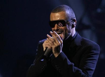 George Michael performs on stage during his concert in Prague George Michael performs on stage during his concert in Prague