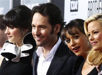 Cast members pose at the premiere of the film "Our Idiot Brother" in Hollywood Cast members pose at the premiere of the film "Our Idiot Brother" in Hollywood