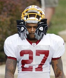 Washington Redskins running back Larry Johnson walks out to the practice field during their third day of NFL football training camp in Virgi Washington Redskins running back Larry Johnson walks out to the practice field during their third day of NFL football training camp in Virgi