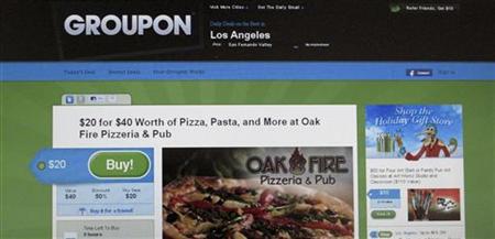 An online coupon sent via email from Groupon is pictured on a laptop screen in Los Angeles An online coupon sent via email from Groupon is pictured on a laptop screen in Los Angeles
