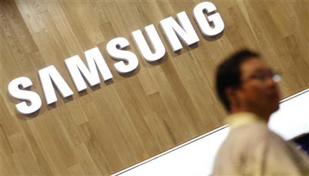 A man shops at a Samsung Electronics shop in Seoul A man shops at a Samsung Electronics shop in Seoul