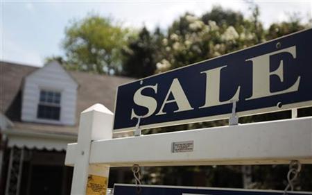 A sale sign advertises a home in Alexandria, Virginia A sale sign advertises a home in Alexandria, Virginia