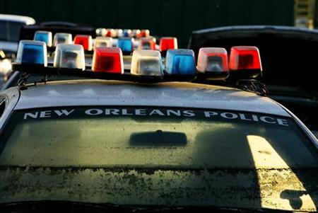 Water lines from flooding caused by hurricanes Katrina and Rita are seen on police cruiser in New Orleans