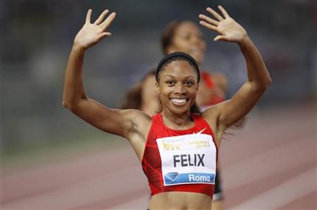 Felix of the U.S. celebrates after winning the women's 400 metres event at the Golden Gala IAAF Diamond League at the Olympic stadium in Rom Felix of the U.S. celebrates after winning the women's 400 metres event at the Golden Gala IAAF Diamond League at the Olympic stadium in Rom