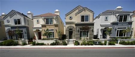 Row homes valued at $400,000 each, which are offered for free in a "buy one, get one free" deal, are seen in Escondido Row homes valued at $400,000 each, which are offered for free in a "buy one, get one free" deal, are seen in Escondido