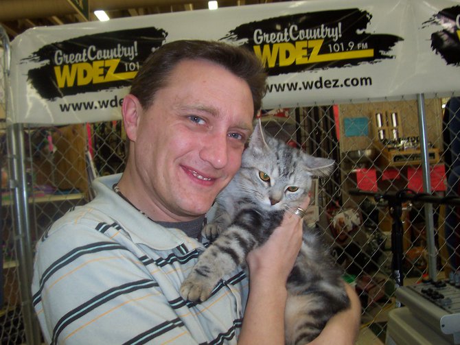 Lee Peek with another furry friend at Caged for Critters part 2 2007