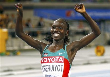 Vivian Cheruiyot of Kenya celebrates winning the women's 10,000 metres final at the IAAF World Championships in Daegu Vivian Cheruiyot of Kenya celebrates winning the women's 10,000 metres final at the IAAF World Championships in Daegu