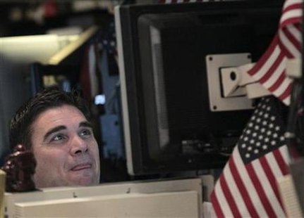 A trader works on the floor of the New York Stock Exchange A trader works on the floor of the New York Stock Exchange