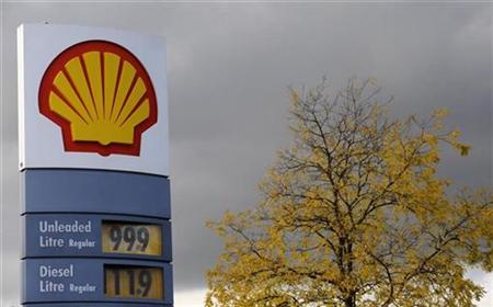 Signage for a Shell petrol station is seen in west London Signage for a Shell petrol station is seen in west London
