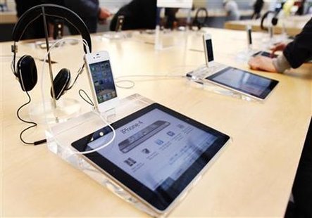 A dedicated iPad station is seen in front of an iPhone at the Apple store in New York A dedicated iPad station is seen in front of an iPhone at the Apple store in New York