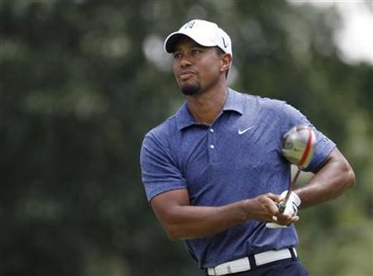 Tiger Woods of the U.S. watches his shot from the third tee during the second round of the 93rd PGA Championship golf tournament at the Atla Tiger Woods of the U.S. watches his shot from the third tee during the second round of the 93rd PGA Championship golf tournament at the Atla