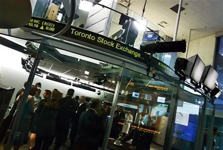 People attend a market open ceremony for Toronto Stock Exchange at the TSX Broadcast Centre in Toronto People attend a market open ceremony for Toronto Stock Exchange at the TSX Broadcast Centre in Toronto