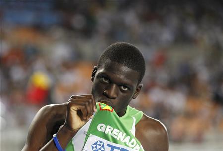 James kisses the flag on his shirt after winning the men's 400 metres final at the IAAF World Athletics Championships in Daegu James kisses the flag on his shirt after winning the men's 400 metres final at the IAAF World Athletics Championships in Daegu