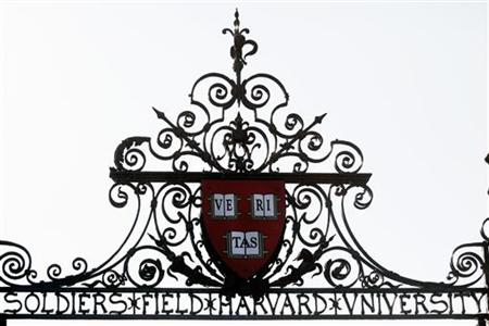 Harvard's seal sits atop a gate to the athletic fields at Harvard University in Cambridge Harvard's seal sits atop a gate to the athletic fields at Harvard University in Cambridge