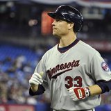 Twins batter Justin Morneau runs back to the dugout after flying out during their MLB American League game in Toronto Twins batter Justin Morneau runs back to the dugout after flying out during their MLB American League game in Toronto