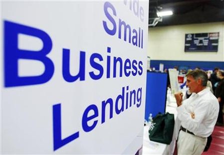 Current and prospective small business owners talk to vendors with information about state, federal, and private funding resources at a Smal Current and prospective small business owners talk to vendors with information about state, federal, and private funding resources at a Smal