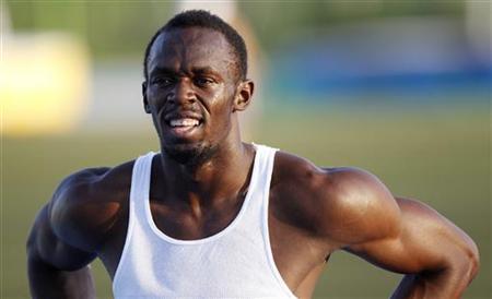 Bolt of Jamaica walks during training session near the Athlete's village at the IAAF World Championships in Daegu Bolt of Jamaica walks during training session near the Athlete's village at the IAAF World Championships in Daegu