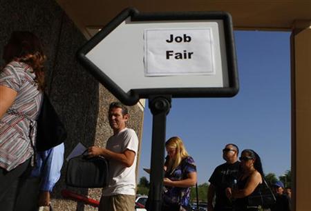 People wait in line to enter a job fair at the Phoenix Workforce Connection in Phoenix People wait in line to enter a job fair at the Phoenix Workforce Connection in Phoenix