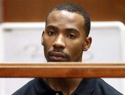 Former Los Angeles Lakers guard Javaris Crittenton appears in Los Angeles Superior Court for an extradition hearing with attorney Brian Stee