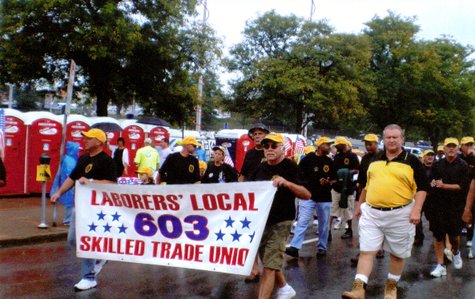 Marchers in a Labor Day parade. Marchers in a Labor Day parade.