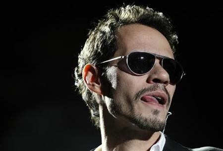 Singer Marc Anthony performs during a concert as part of his Iconos World Tour in Caracas Singer Marc Anthony performs during a concert as part of his Iconos World Tour in Caracas