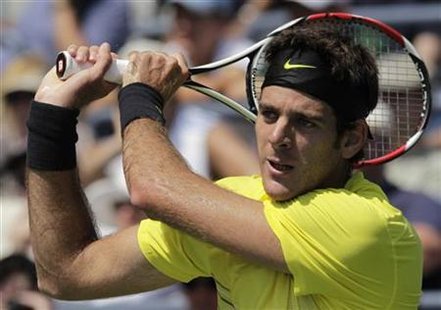 Juan Martin Del Potro of Argentina hits a return to compatriot Diego Junqueira during their match at the U.S. Open tennis tournament in New Juan Martin Del Potro of Argentina hits a return to compatriot Diego Junqueira during their match at the U.S. Open tennis tournament in New
