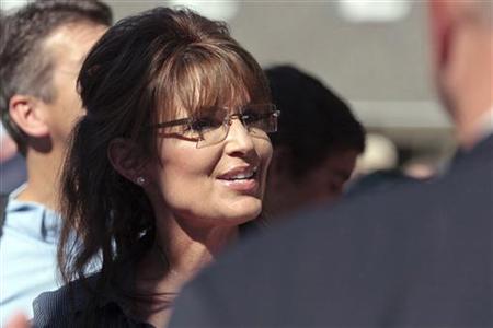 Former Alaska governor Sarah Palin greets supporters as she arrives for the premiere of a documentary about her entitled "The Undefeated" in Former Alaska governor Sarah Palin greets supporters as she arrives for the premiere of a documentary about her entitled "The Undefeated" in