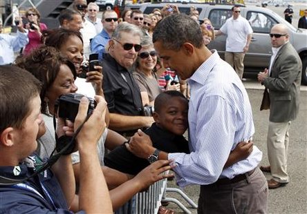 U.S. President Barack Obama gets a hug from a boy upon his arrival in Newark, New Jersey U.S. President Barack Obama gets a hug from a boy upon his arrival in Newark, New Jersey