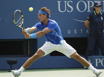 Rafael Nadal of Spain hits a return to David Nalbandian of Argentina during their match at the U.S. Open tennis tournament in New York Rafael Nadal of Spain hits a return to David Nalbandian of Argentina during their match at the U.S. Open tennis tournament in New York
