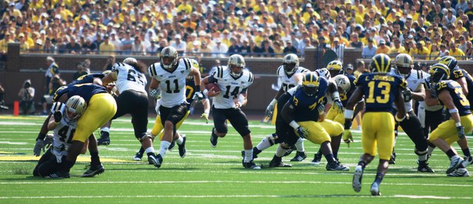 Shots from the Western Michigan-Michigan game, Sept 3, 2011. The game was called short after 3 quarters due to storms, giving Michigan a 34-10 win. Photos by Sean Patrick Duross.