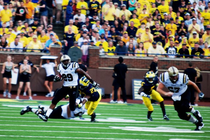 Shots from the Western Michigan-Michigan game, Sept 3, 2011. The game was called short after 3 quarters due to storms, giving Michigan a 34-10 win. Photos by Sean Patrick Duross.