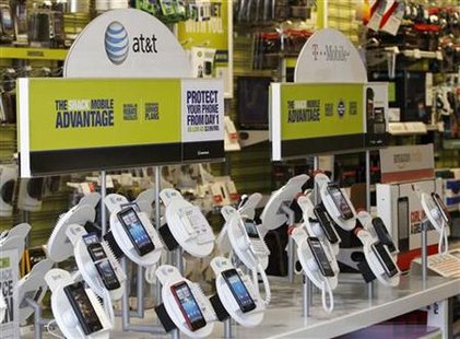 AT&T mobile phones are seen for sale alongside T-Mobile phones at a RadioShack electronics store in Los Angeles AT&T mobile phones are seen for sale alongside T-Mobile phones at a RadioShack electronics store in Los Angeles