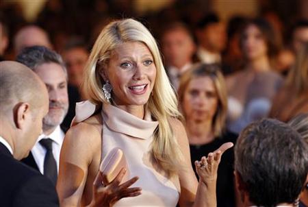 Actress Paltrow, cast member of movie "Contagion", reacts on red carpet at Cinema Palace during 68th Venice Film Festival Actress Paltrow, cast member of movie "Contagion", reacts on red carpet at Cinema Palace during 68th Venice Film Festival