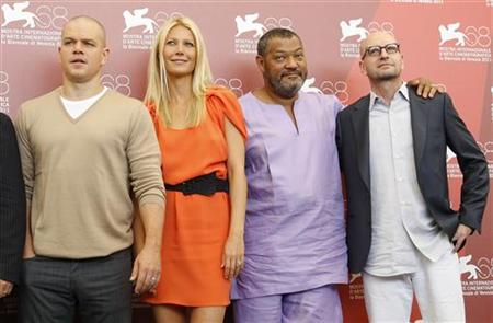 Soderbergh poses with Damon, Paltrow, Fishburne during a photocall of their film "Contagion" at the 68th Venice Film Festival