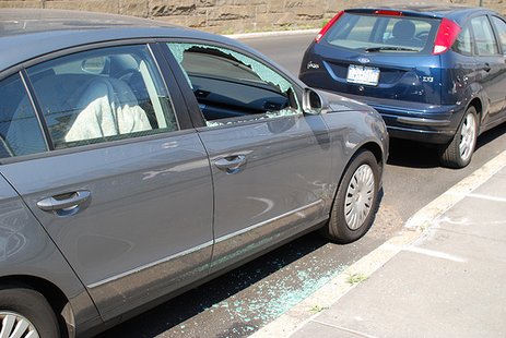 A vehicle with a broken window similar to the nature of the Springfield vandalism. A vehicle with a broken window similar to the nature of the Springfield vandalism.