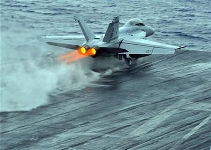 US Navy handout photo of an F/A-18 being catapulted off the USS Enterprise in the Red Sea US Navy handout photo of an F/A-18 being catapulted off the USS Enterprise in the Red Sea