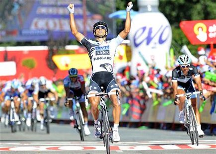 Saxo Bank Sungard rider Juan Jose Haedo of Argentina wins the 16th stage of the Tour of Spain cycling race between Villa Romana La Olmeda an Saxo Bank Sungard rider Juan Jose Haedo of Argentina wins the 16th stage of the Tour of Spain cycling race between Villa Romana La Olmeda an