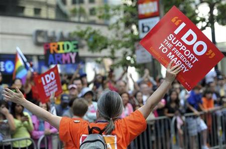 A gay marriage supporter carries a sign at the 41st LGBT Pride parade in San Francisco A gay marriage supporter carries a sign at the 41st LGBT Pride parade in San Francisco