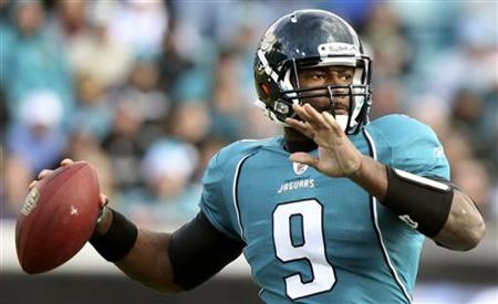 Jacksonville Jaguars quarterback David Garrard looks for an open receiver during the second half of their NFL football game against the Oakl Jacksonville Jaguars quarterback David Garrard looks for an open receiver during the second half of their NFL football game against the Oakl