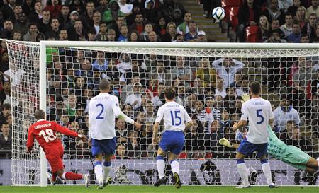 Wales's Earnshaw shoots over the crossbar during their Euro 2012 Group G qualifying soccer match against England at Wembley Stadium in Londo Wales's Earnshaw shoots over the crossbar during their Euro 2012 Group G qualifying soccer match against England at Wembley Stadium in Londo