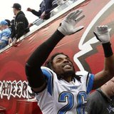 Detroit Lions safety Louis Delmas (26) celebrates the Lions overtime victory over the Tampa Bay Buccaneers in Tampa, Florida December 19, 2010.  The win ended Detroit's NFL record 26-game road losing streak.  The Lions open their 2011 season in Tampa.  REUTERS