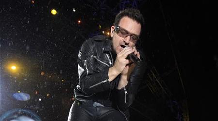 Bono, lead singer of Irish band U2 performs on the third day of the Glastonbury Festival in Worthy Farm, Somerset Bono, lead singer of Irish band U2 performs on the third day of the Glastonbury Festival in Worthy Farm, Somerset