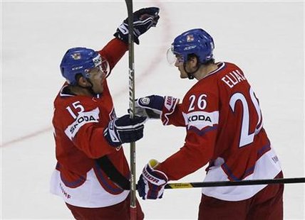 Czech Republic's Jan Marek and Patrik Elias celebrate after scoring a goal against Slovakia during their qualification round game at the Ice Czech Republic's Jan Marek and Patrik Elias celebrate after scoring a goal against Slovakia during their qualification round game at the Ice