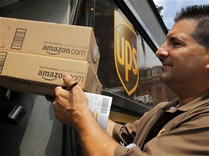 UPS driver T.J. Dellasala delivers two packages from Amazon.com in Boston, Massachusetts UPS driver T.J. Dellasala delivers two packages from Amazon.com in Boston, Massachusetts